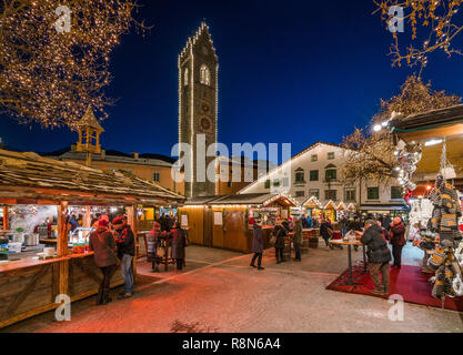 The colorful christmas market in Vipiteno in the evening. Trentino Alto Adige, Italy. Stock Photo