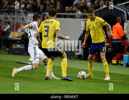 Solna, Sweden - November 20, 2018. Sweden national team players Mikael Lustig and Victor Lindelof against Russia national team striker Dmitry Poloz du Stock Photo