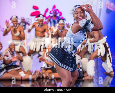South African dancers from Amazebra Folklore Dance Ensemble perform at the Maskdance festival held in Andong Korea Stock Photo