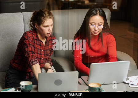 Businesswomen working on laptop Stock Photo