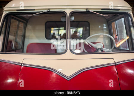 Vintage car. Front of retro car with windshield and steering wheel Stock Photo