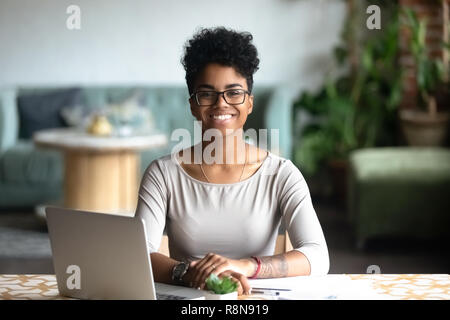 Head shot portrait of smiling African American woman Stock Photo