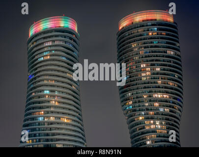 The Absolute Towers Condominiums Mississauga, Ontario Canada a.k.a. (aka) Marilyn Monroe buildings during night time (with holiday lights) Stock Photo