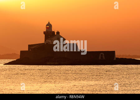 Fenit Lighthouse at Sunset in Tralee Bay, County Kerry, Ireland Stock Photo