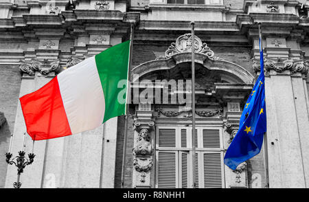 italian and european flags on a balcony of the italian army academy waving in the wind - modena, ducal palace Stock Photo