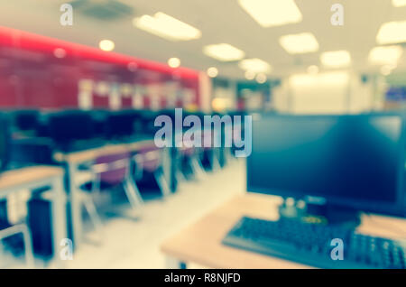 Abstract blurred photo of empty server room, education and business concept Stock Photo
