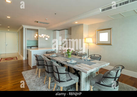 BANGKOK, THAILAND - APRIL 25 :  Luxury Interior living room with kitchen zone and restaurant set at My resort as river condominium beside the chao phr Stock Photo
