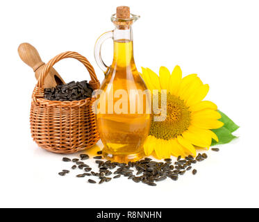 Sunflower oil, seeds and flower isolated on white background Stock Photo