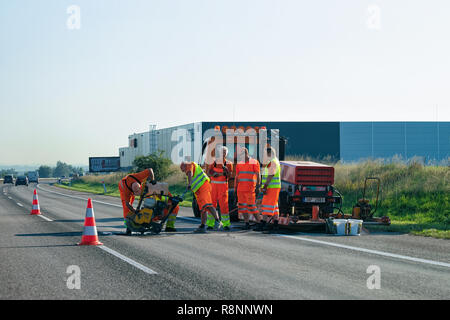 Brno, Czech Republic - September 19, 2018: Workers doing road works in Czech Republic. Stock Photo