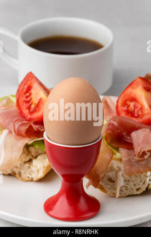 closeup of a cooked egg with coffee Stock Photo