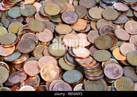 Montreal, Quebec, Canada / Dec, 16th 2018 : A huge pile of pennies, dark brown money. Stock Photo