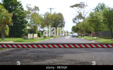 Close up view of red white stripes bar closing road Stock Photo