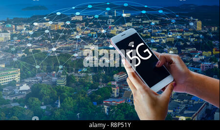 phone computer 5g Earth businessman connect worldwide waiter hand holding an empty digital tablet with smart and 5G network connection concept Stock Photo