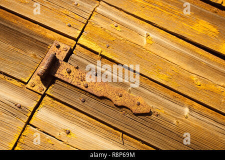 Close-up of rusty hinge on wooden building, Porvoo, Finland Stock Photo