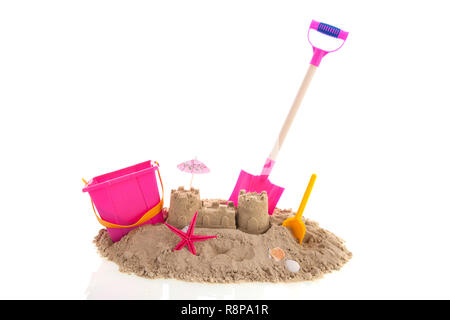 Family vacation with toys on summer beach isolated over white background Stock Photo