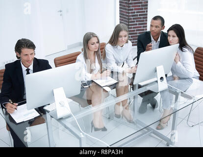 successful managers discussing new business project in modern office Stock Photo
