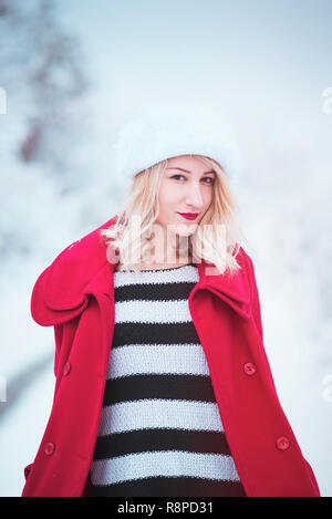 Young woman in snow portrait Stock Photo