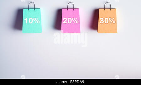 Colorful shopping bags with discount percent 3D illustration Stock Photo