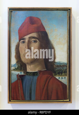 Painting 'Portrait of an Unknown Man with Red Beret' attributed to Italian Renaissance painter Vittore Carpaccio (1490-1493) on display in the Museo Correr in Venice, Italy. Stock Photo