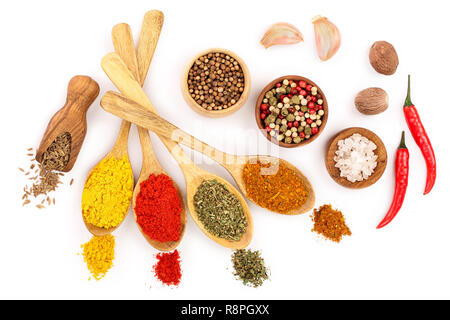 mix of spices in wooden spoon isolated on a white background. Top view. Flat lay. Set or collection Stock Photo