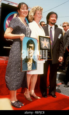 HOLLYWOOD, CA - APRIL 28: Shannon Lee, mother Linda Lee Caldwell and Robert Lee attend the Hollywood Walk of Fame Ceremony for Bruce Lee on April 28, 1993 at 6933 Hollywood Boulevard in Hollywood, California. Photo by Barry King/Alamy Stock Photo Stock Photo