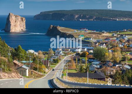 Canada, Quebec, Gaspe Peninsula, Perce, elevated view of town and Perce Rock from Rt 132 Stock Photo