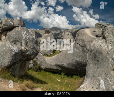 Giant limestone boulders and dramatic cloudy sky, Castle Hill, South Island New Zealand Stock Photo