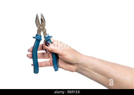 old pliers in female hand with manicure isolated on white background Stock Photo