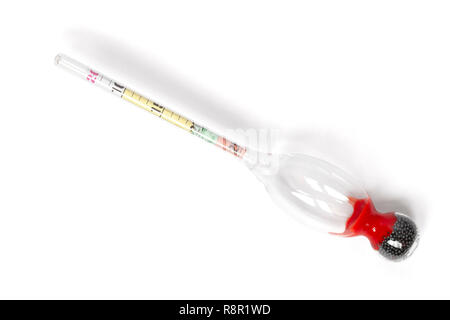 Glass gauge hydrometer refractometer for measuring of a residual sugar concentration in wine isolated on white. With a clipping path. Stock Photo