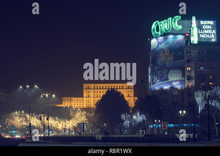 13 DEC 2018, Romania, Bucharest. Christmas lights and Parliament. Festive December. Long exposure image. Selective focus Stock Photo