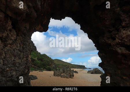 View of Morong Beach through Nakabuang Arc in Sabtang the southernmost island of the Batanes island group the northernmost archipelago province of the Philippines situated in the Cagayan Valley region Stock Photo