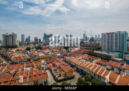 Aerial view of shophouses in Little India, the tall buildings far end is the modern skyline of Singapore. A great transformation to a first world Stock Photo