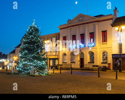 Christmas Tree in the Marketn Place and Town Hall at dusk Ripon North Yorkshire England Stock Photo