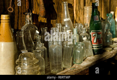 Antique bottles sit on a shelf at Booker Hardware & Cutlery, Oct. 10, 2011, in Holly Springs, Mississippi. The store was established in 1937. Stock Photo
