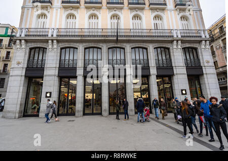 Madrid, Spain - December 2018: Apple Store located in puerta del Sol, with pedestrians passing by outside the store. Stock Photo