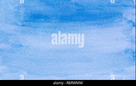 Abstract hand painted blue full frame watercolor background with watercolour stains and paper texture. Stock Photo