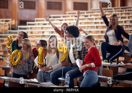 group of young international students celebrating holiday Stock Photo