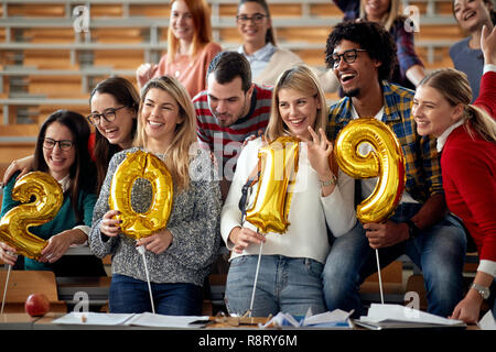 happy students having party on university celebrating holiday Stock Photo