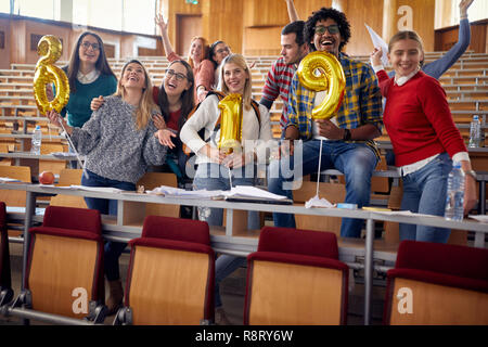 young friends having party on university celebrating holiday Stock Photo