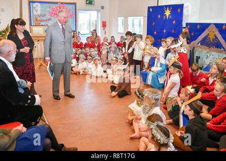 The Prince of Wales during a nativity performance at Leighterton Primary School, Gloucestershire, where he is there to see the new school building and watch pupils take part in a Christmas performance. Stock Photo