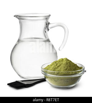 Henna powder and water jug isolated on white Stock Photo