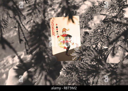 Joker Playing Card in Trees Stock Photo