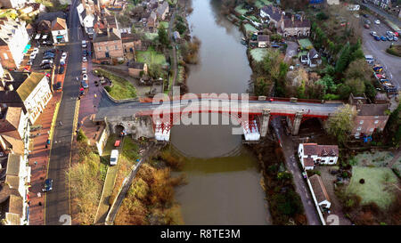The worlds oldest Iron bridge in Ironbridge Shropshire unveiled in it's new colour of red after months of renovation work. The bridge has been dark grey for most of it's life but the restoration work revealed that the original colour was red. Credit: David Bagnall/Alamy Live News Stock Photo