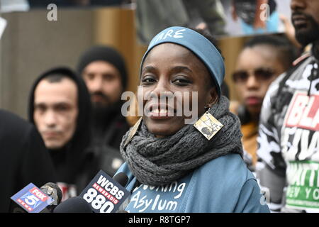 New York, USA. 17th Dec, 2018. New York, U.S., 17 December 2018 Statue of Liberty climber Patricia Okoumou speaks outside federal court following her conviction by a federal magistrate judge on misdemeanor charges of trespassing, disorderly conduct, and interfering with the functioning of government for her act of civil disobedience on July 4. Okoumou climbed the base of the statue to protest against Trump administration immigration policies. She is to be sentenced on March 5, 2019. Credit: Joseph Reid/Alamy Live News Stock Photo