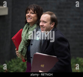 Downing Street, London, UK. 18 December 2018. Matt Hancock, Secretary of State for Health and Social Care arrives in Downing Street with Claire Perry, Minister of State for Energy and Clean Growth for weekly cabinet meeting. Credit: Malcolm Park/Alamy Live News. Stock Photo