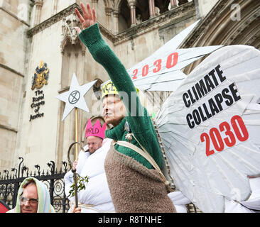 London, UK. 18th Dec, 2018. Vivienne Westwood anti-fracking protest. Vivienne Westwood is joined by climate change activists dressed as an angel, Joseph and three wise men to protest against the Government's fracking policy. This will be followed by a High Court hearing when campaigners will challenge new planning guidance. Credit: Thomas Bowles/Alamy Live News Stock Photo