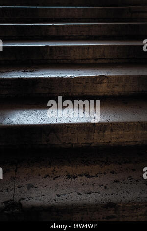 Smooth stone steps reflecting light Stock Photo