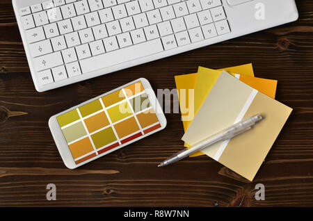 Color samples cmyk on black keyboard desk Stock Photo - Alamy