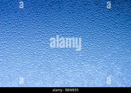 Macro abstract background of water condensation on a window pane Stock Photo