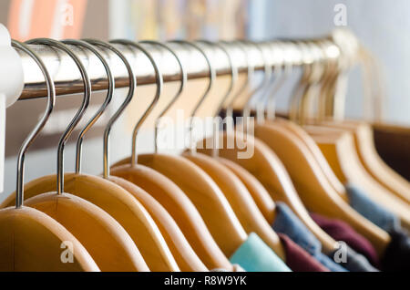 closeup of a lot of wooden hangers Stock Photo